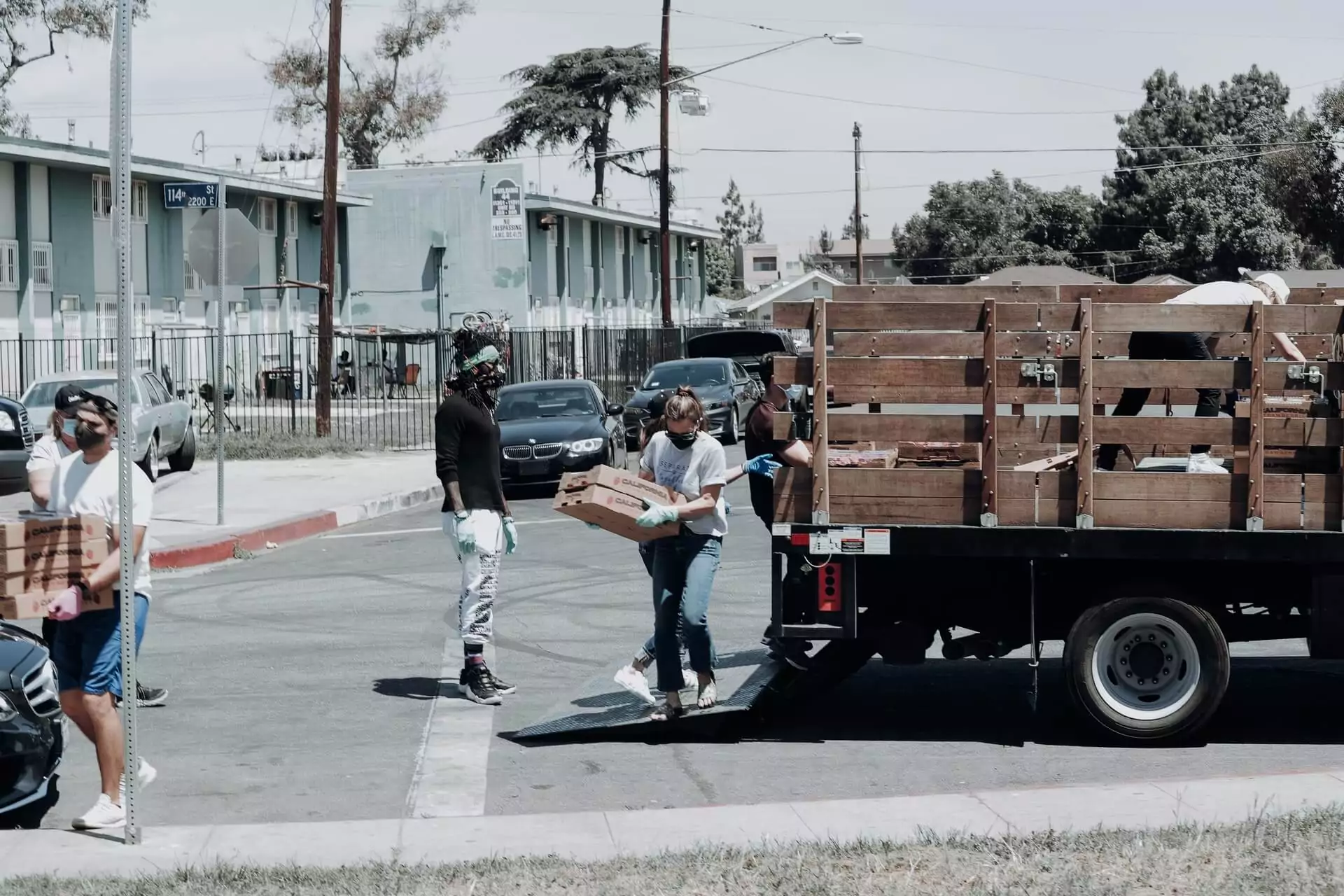 volunteers taking food off truck for food pantry delivery