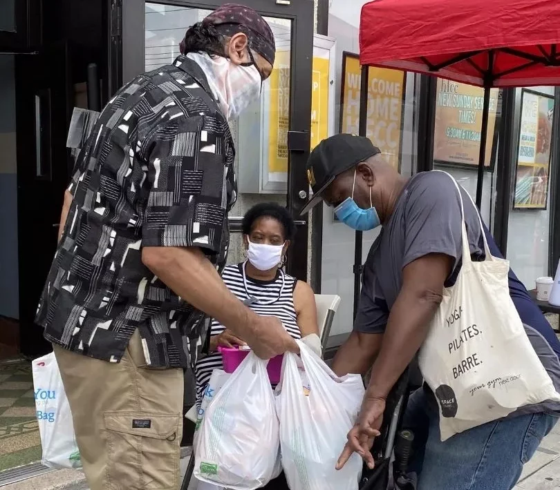 man volunteering at edmnyc food pantry in the bronx