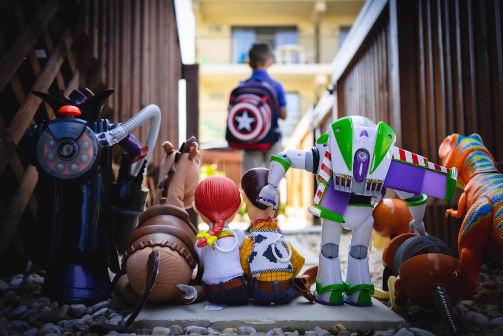 Toy Story toys watching boy go off to school