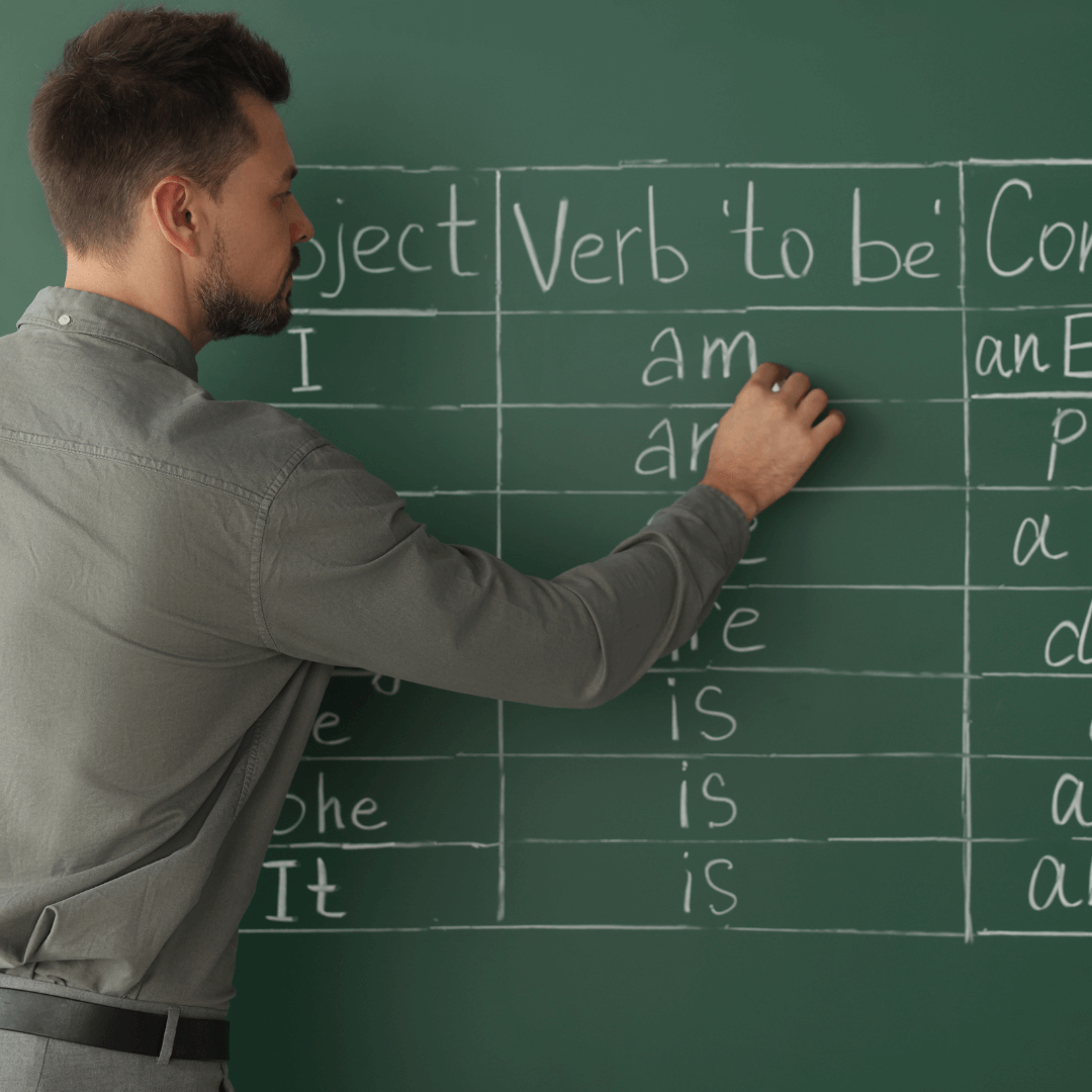 teacher conjugating verbs