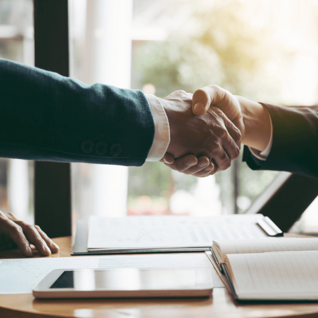 Business people shaking hands