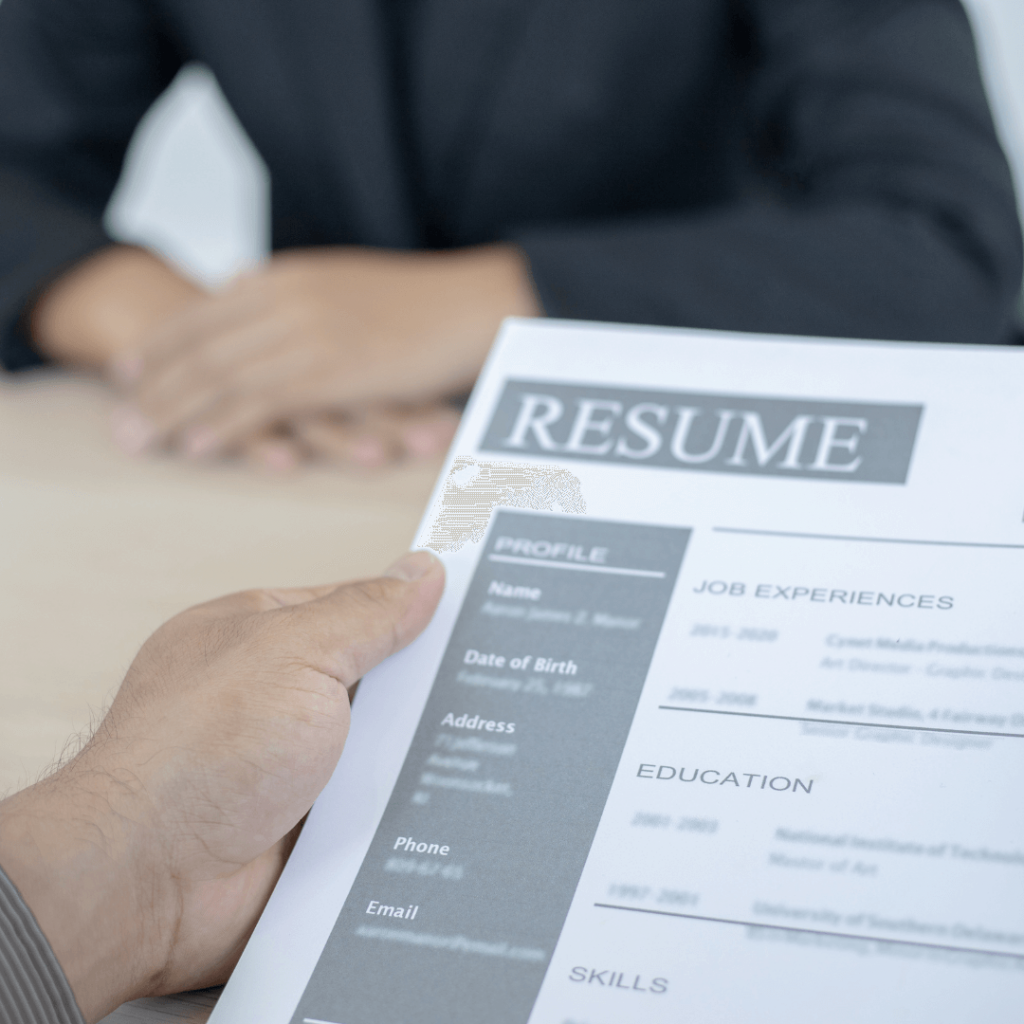person looking at resume during an interview